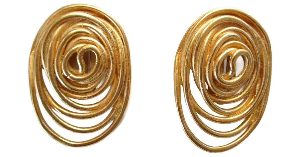 Balenciaga Clips dorados "remolino". 