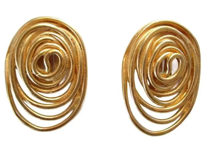 Balenciaga Clips dorados "remolino". 