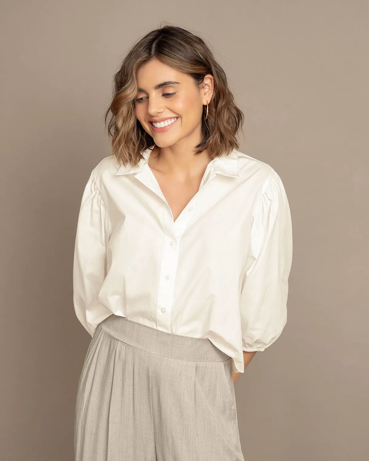 Blusa manga 3/4 con botones y elástico en puos