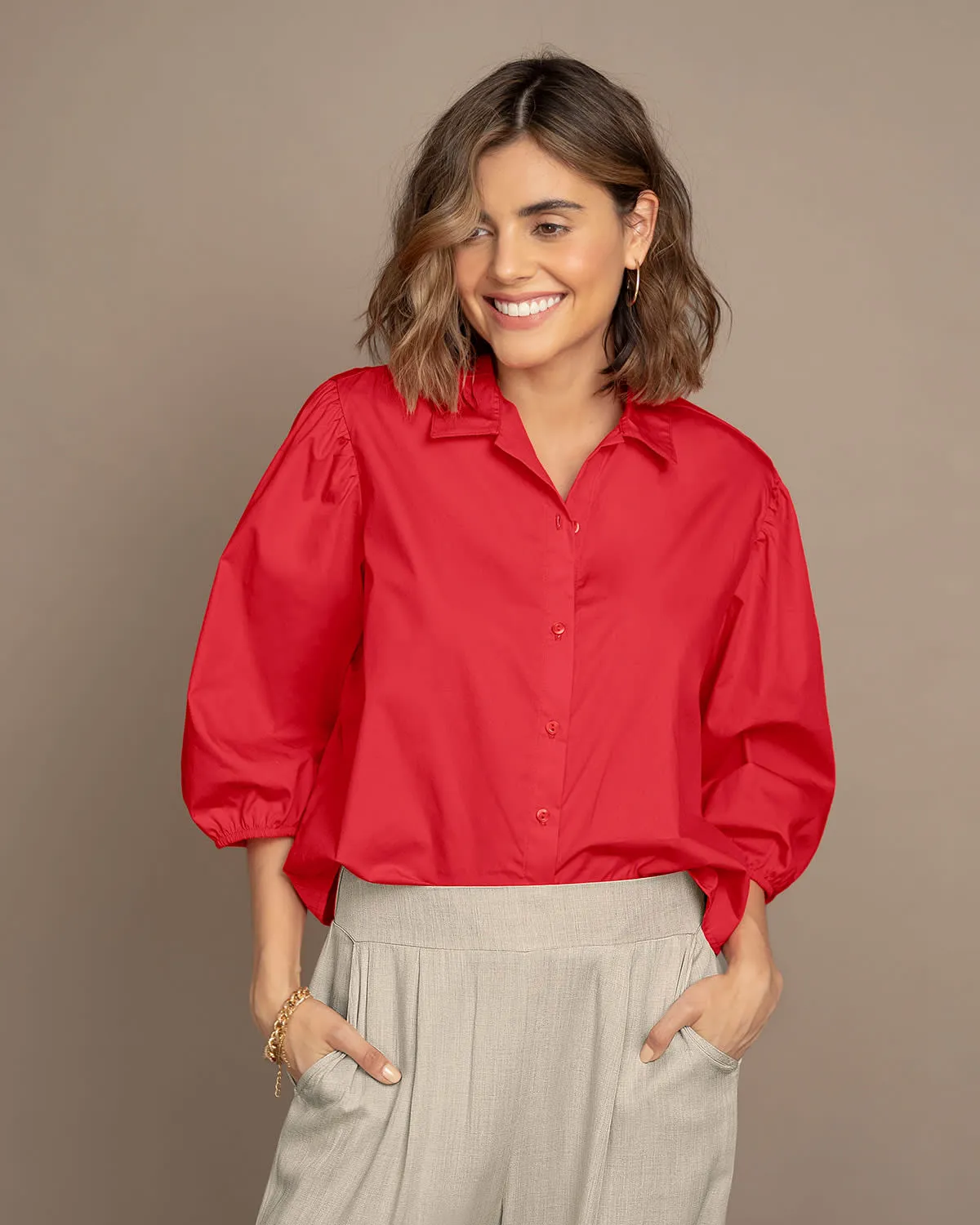 Blusa manga 3/4 con botones y elástico en puos
